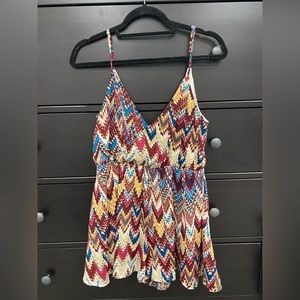 Multi-colored romper. Size medium. Gently used.